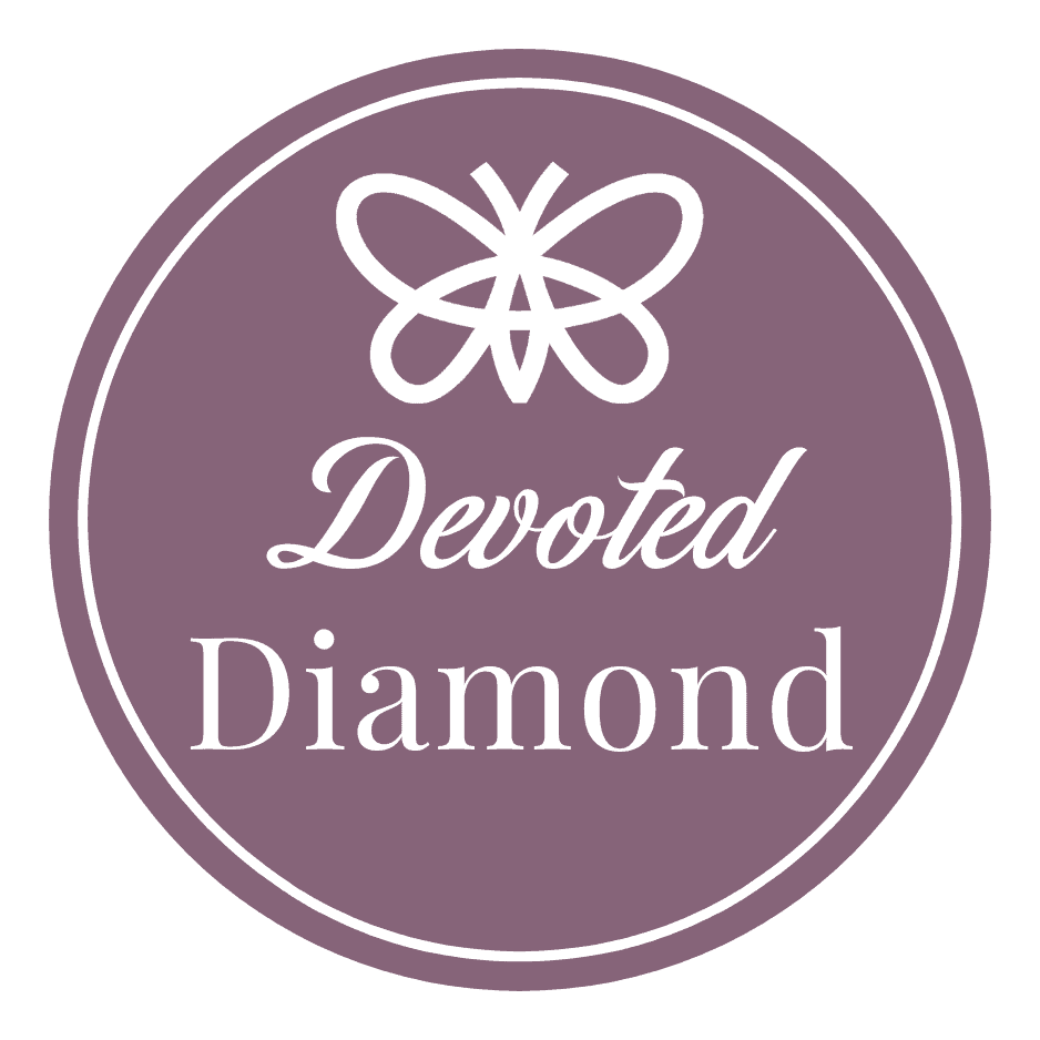 A circular mauve logo with a white butterfly symbol above the words "Devoted Diamond" in elegant script and serif fonts.